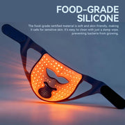 Silicone LED face mask on gray background for at-home skincare